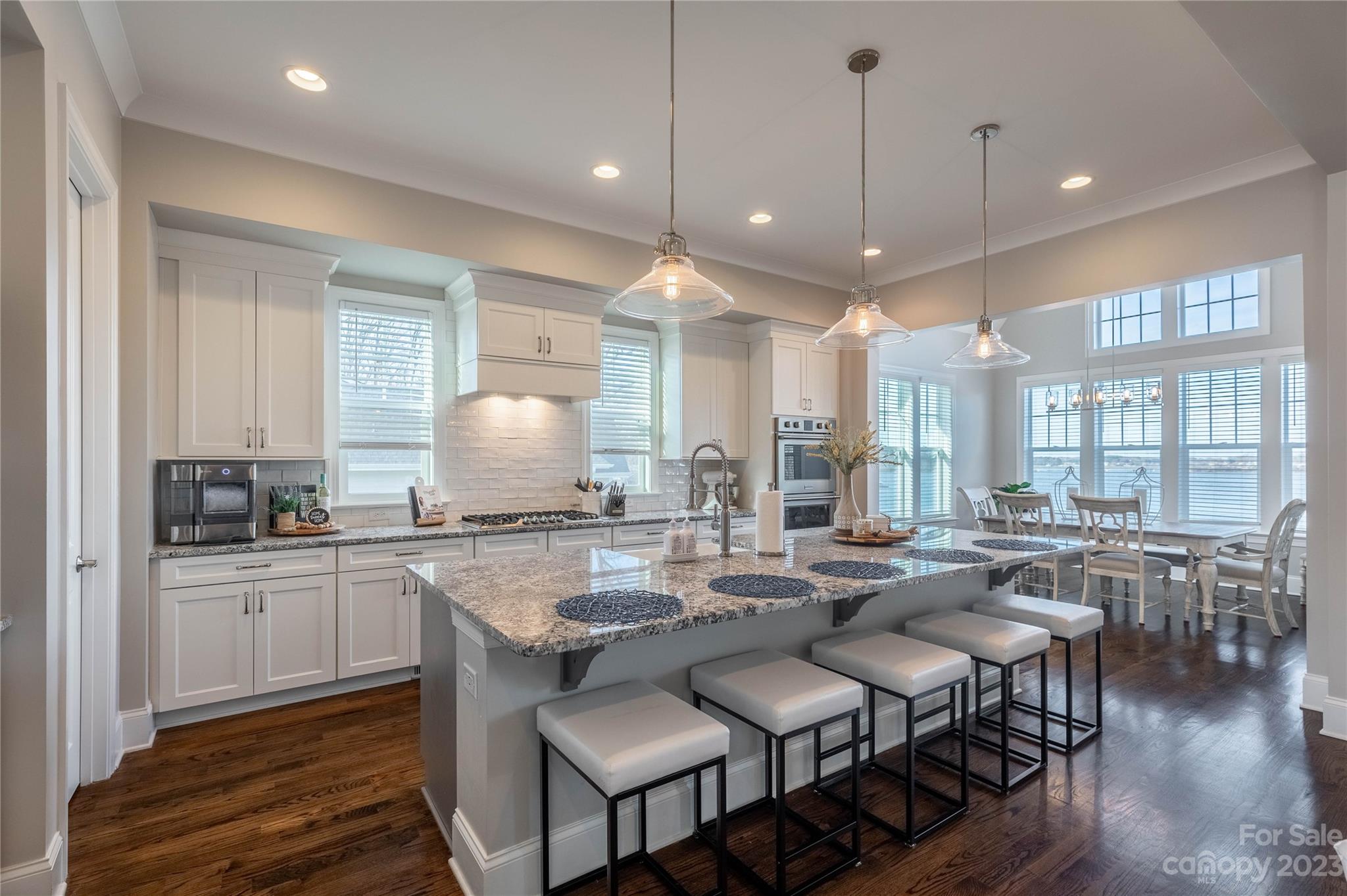 9110 Greenwood Road Terrell, NC 28682 - Photo 9 of 42 a kitchen with lots of counter space and windows