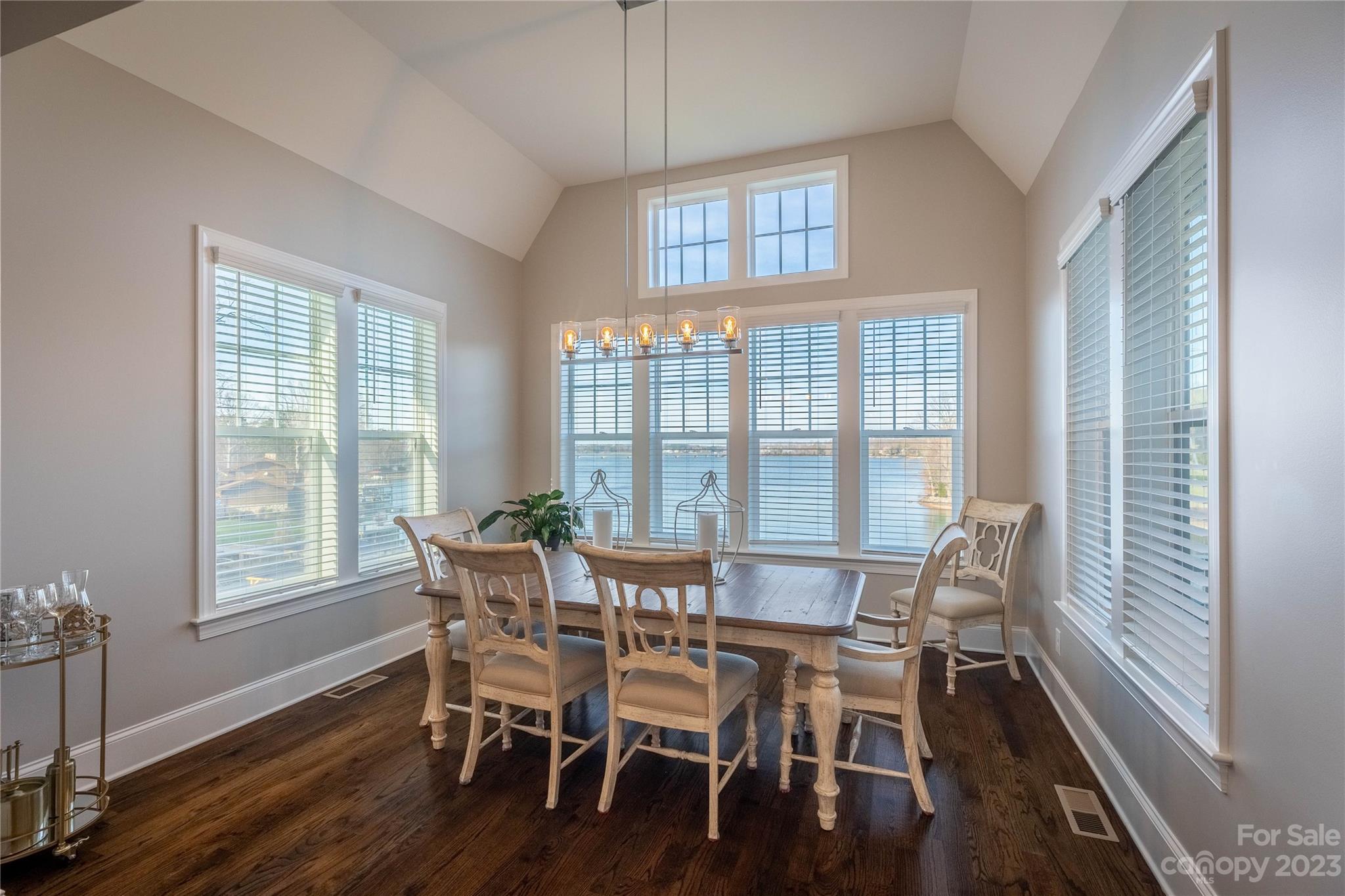 9110 Greenwood Road Terrell, NC 28682 - Photo 10 of 42 a view of a dining room with furniture window and wooden floor