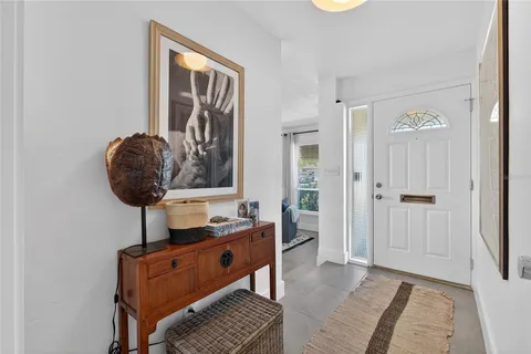 a room with furniture and a window