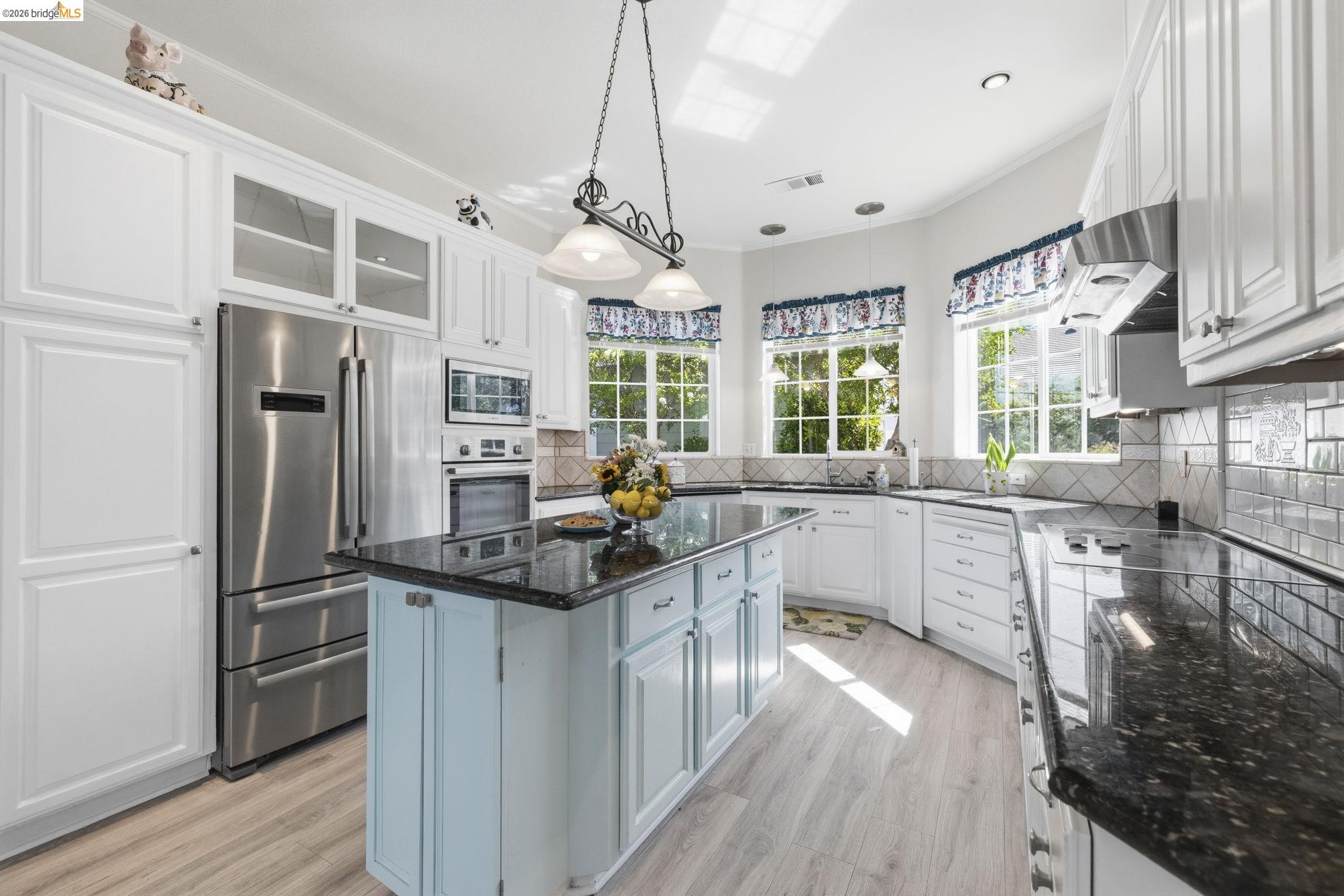 6242 Bluff View Road Copperopolis, CA 95228 - Photo 19 of 59 Kitchen cabinets are lined with pull out shelves and Bosch stainless steel appliances