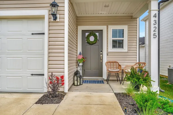 a view of a entryway door front of house
