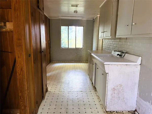 a bathroom with a sink a toilet and a bathtub