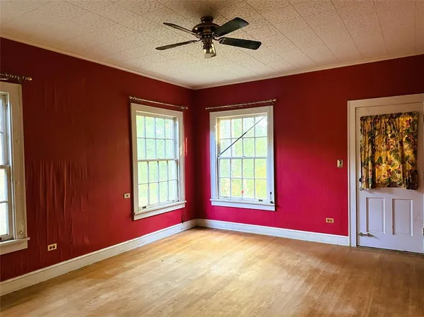 an empty room with windows