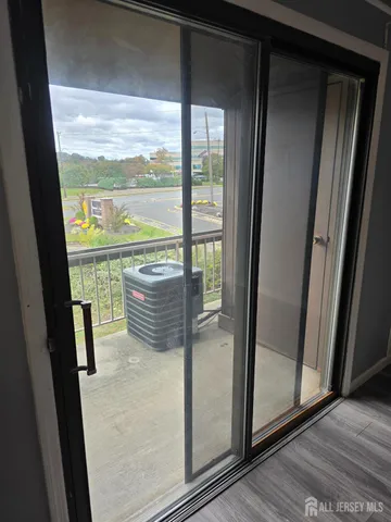 a view of a two chair in the balcony