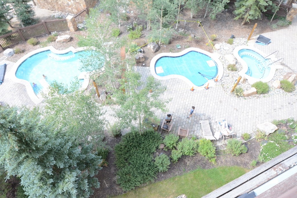910 Copper Road, Unit 505 Frisco, CO 80443 - Photo 19 of 25 Looking down on Passage Point's 3 beautiful hot tubs from Unit #505