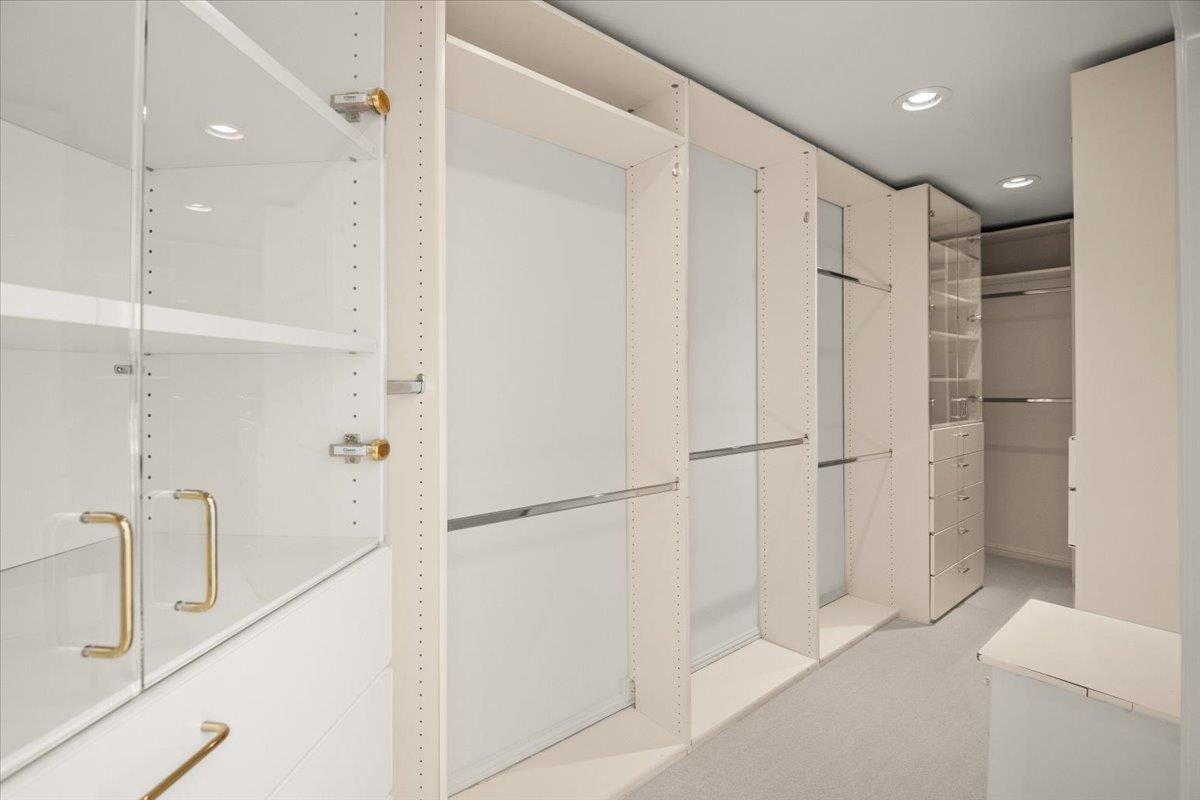 14113 Pike Road Saratoga, CA 95070 - Photo 45 of 78 a bathroom with a shower and a glass door