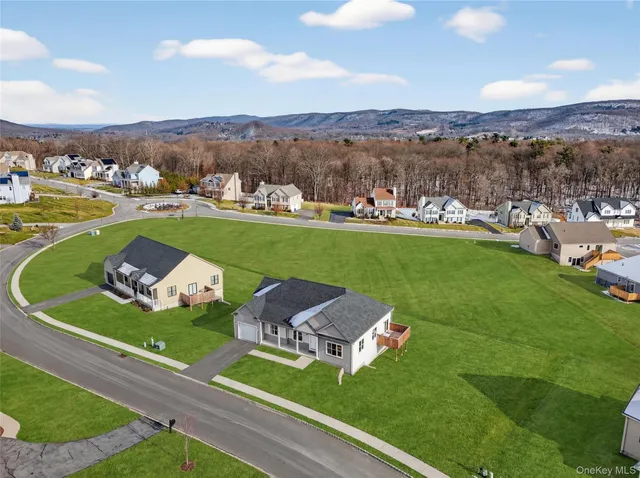 a view of a garden with houses
