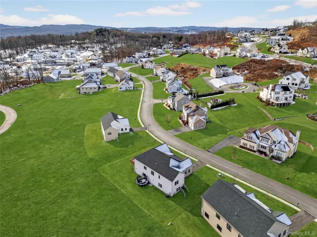 a view of a city with mountains