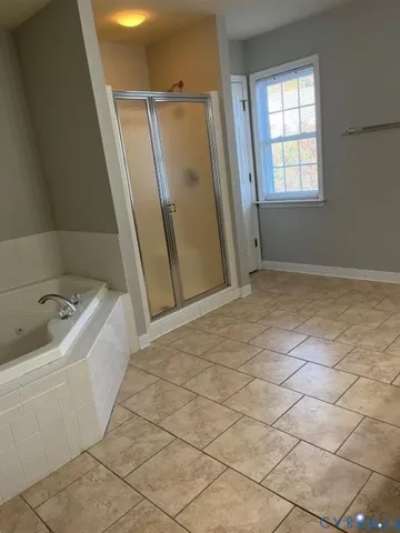 a view of a bathroom with a sink a vanity and a shower