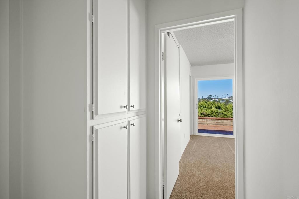 664 Mariposa Circle Chula Vista, CA 91911 - Photo 13 of 34 a view of a hallway with wooden floor