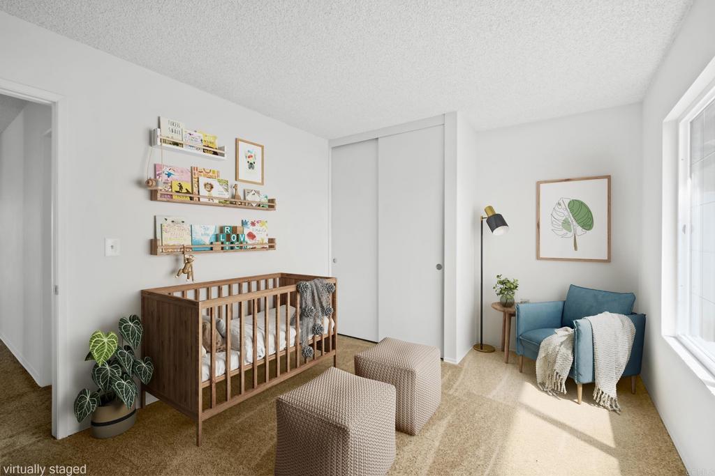 664 Mariposa Circle Chula Vista, CA 91911 - Photo 17 of 34 a bedroom with furniture and a window