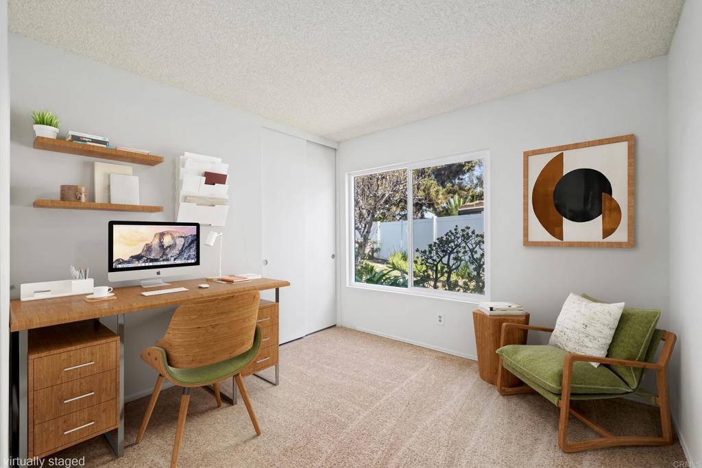 664 Mariposa Circle Chula Vista, CA 91911 - Photo 19 of 34 a living room with furniture and a window