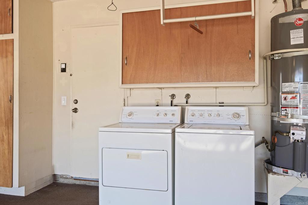 664 Mariposa Circle Chula Vista, CA 91911 - Photo 24 of 34 a utility room with dryer and washer