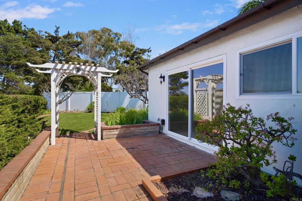 664 Mariposa Circle Chula Vista, CA 91911 - Photo 25 of 34 a view of a backyard with potted plants