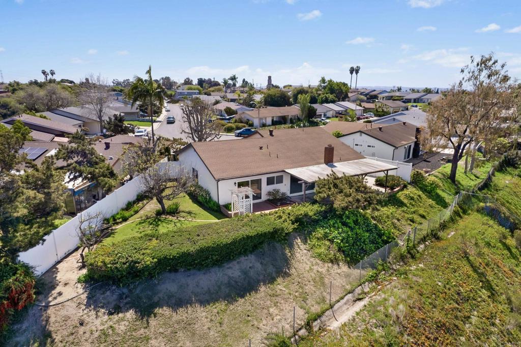 664 Mariposa Circle Chula Vista, CA 91911 - Photo 31 of 34 an aerial view of residential houses with outdoor space and trees all around