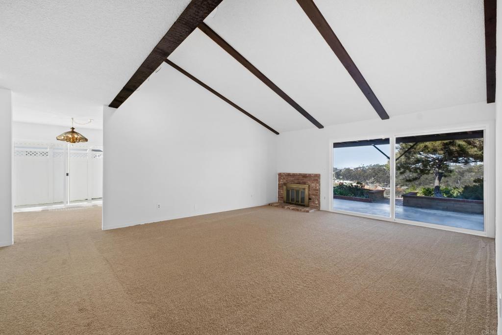 664 Mariposa Circle Chula Vista, CA 91911 - Photo 4 of 34 a view of a livingroom with wooden floor and stairs