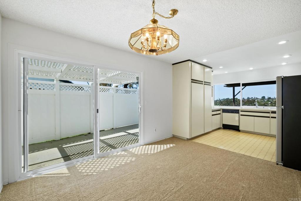 664 Mariposa Circle Chula Vista, CA 91911 - Photo 6 of 34 a view of a kitchen with a sink and refrigerator