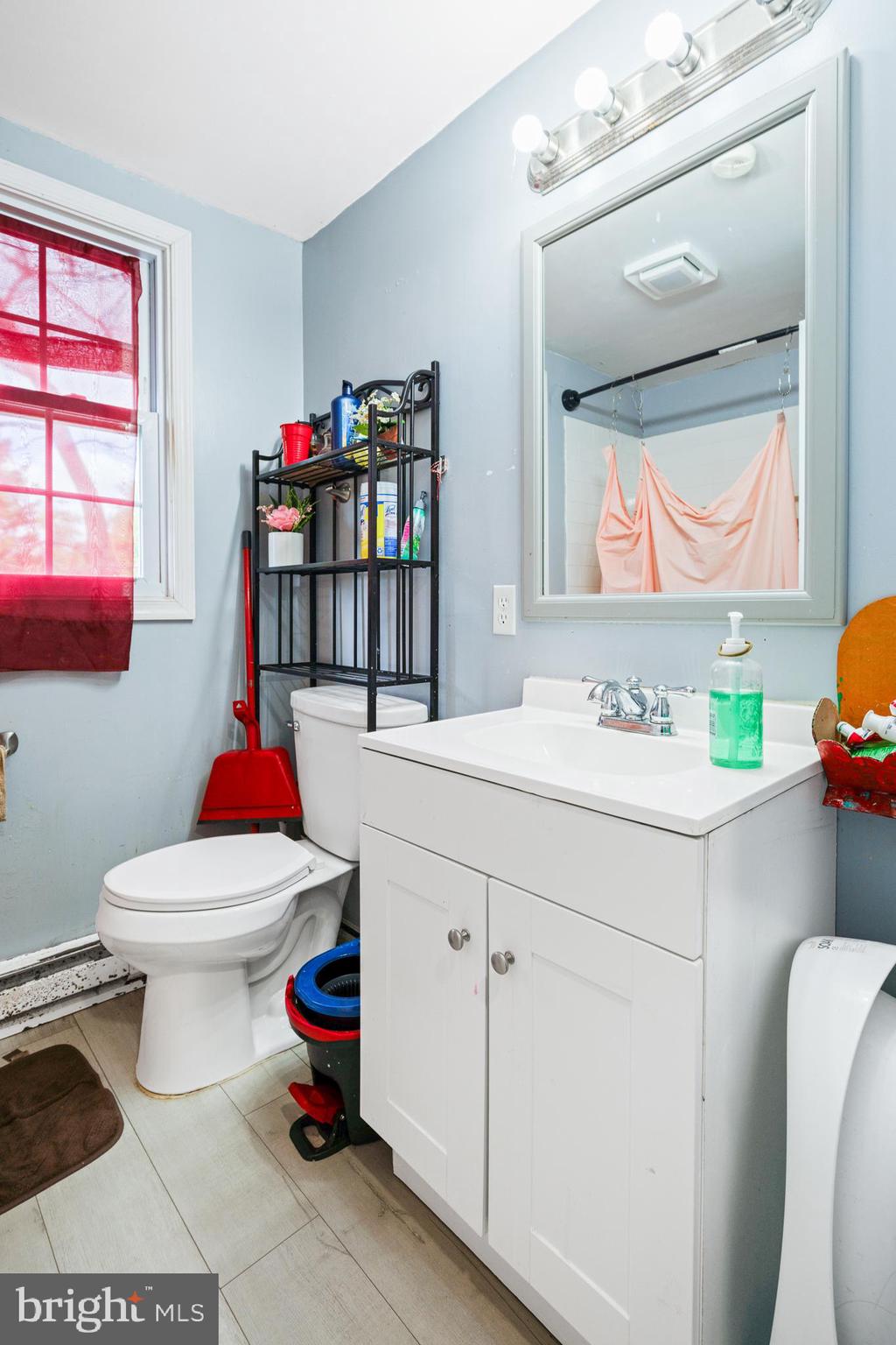 1731 Limestone Road Cochranville, PA 19330 - Photo 13 of 29 a bathroom with a sink toilet and a mirror