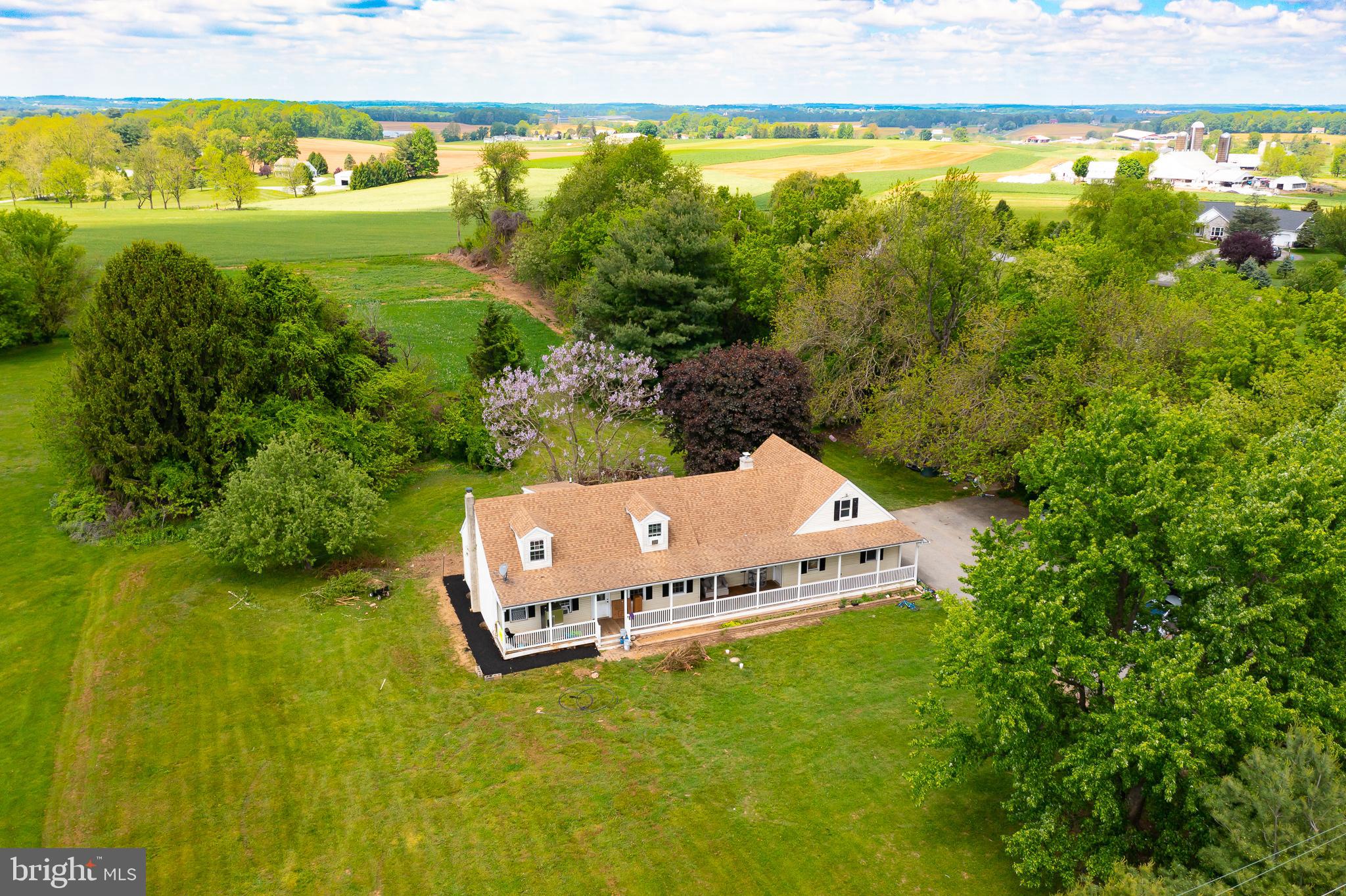 1731 Limestone Road Cochranville, PA 19330 - Photo 27 of 29 a view of a big yard with an outdoor seating