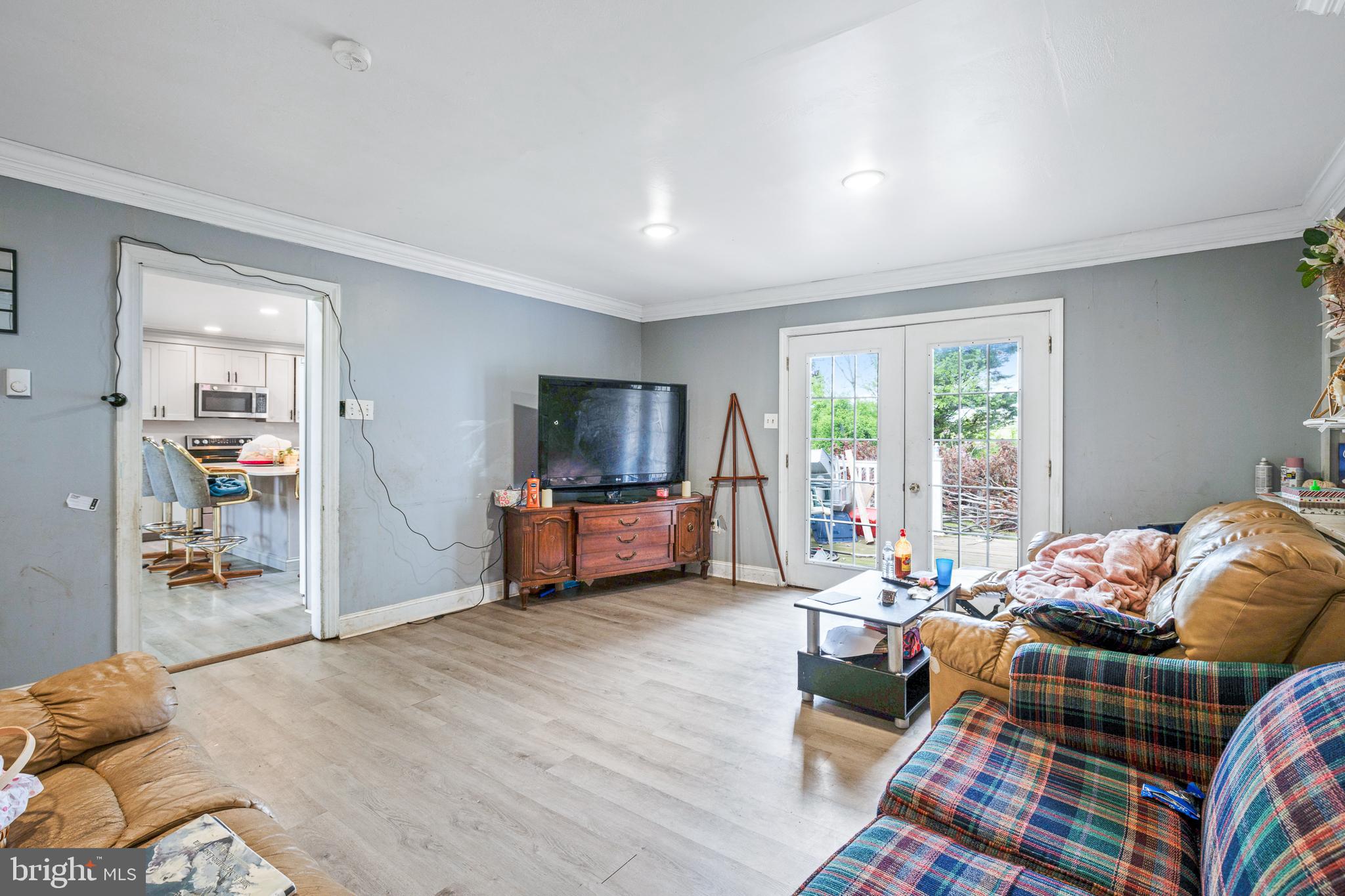 1731 Limestone Road Cochranville, PA 19330 - Photo 4 of 29 a living room with furniture and a flat screen tv