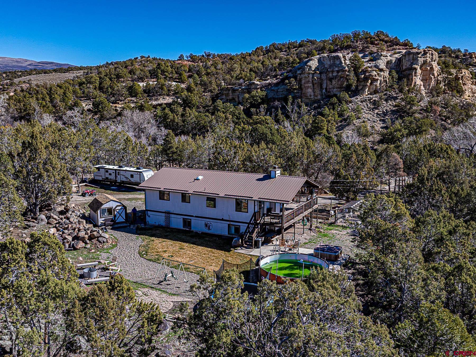 18697 Ward Creek Road Cedaredge, CO 81413 - Photo 45 of 45 a aerial view of a house