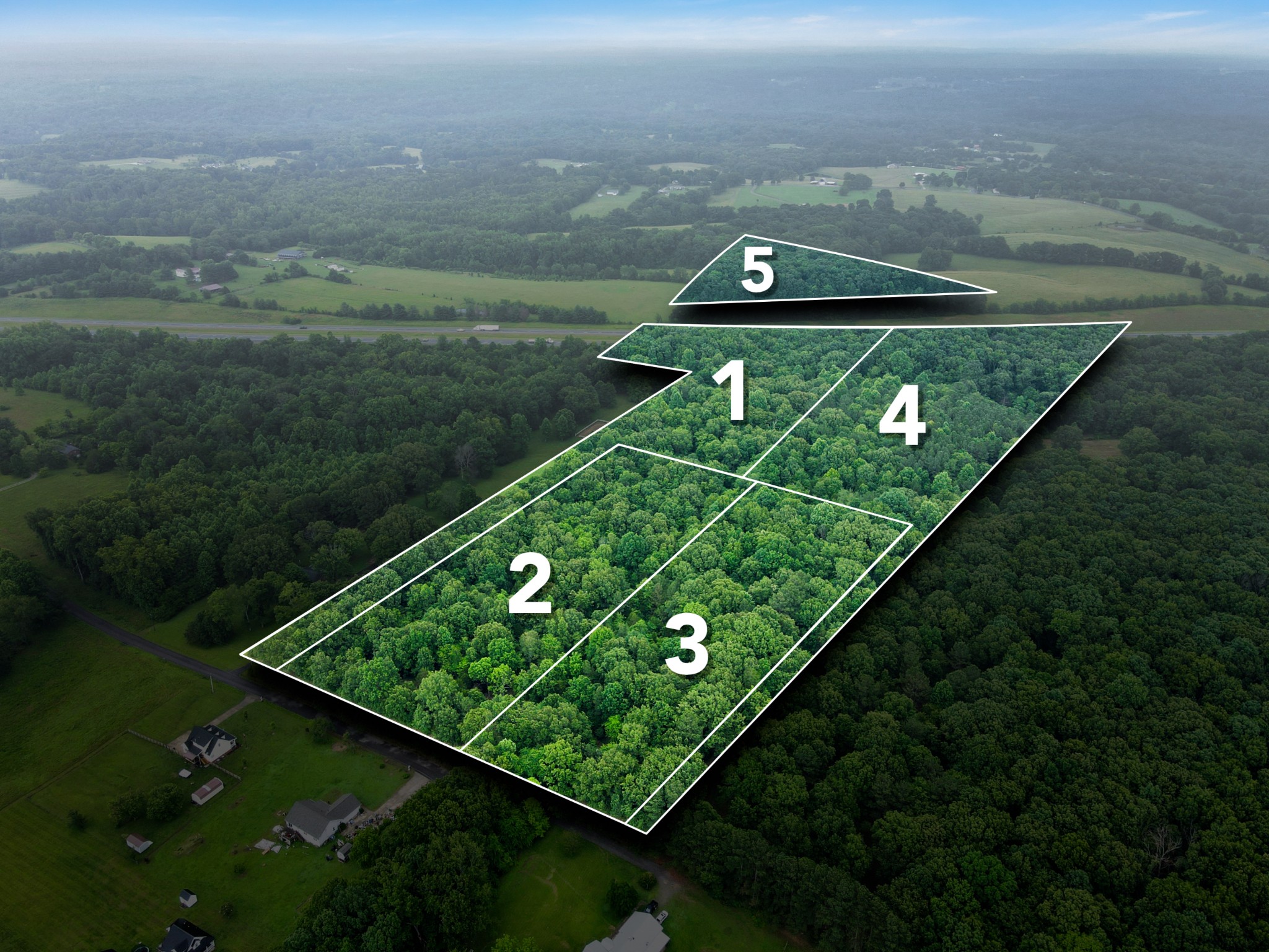 a view of a back yard of the green space