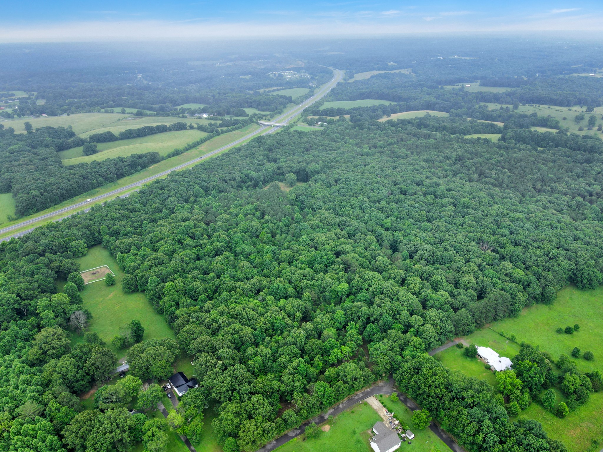 0 Eli Road Bon Aqua, TN 37025 - Photo 6 of 8 a view of a green field with lots of green space in it