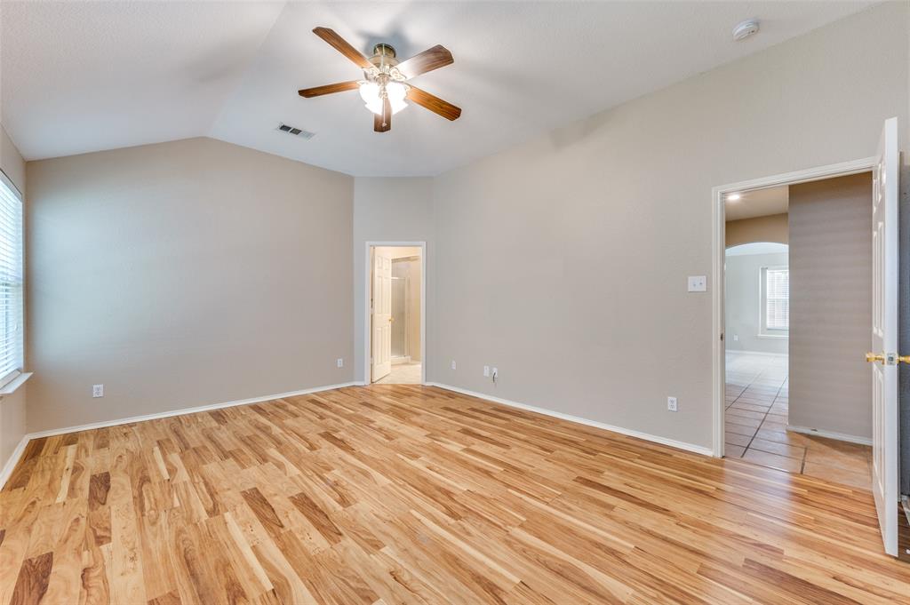 1117 Red Hawk Drive Frisco, TX 75033 - Photo 25 of 31 an empty room with wooden floor and windows