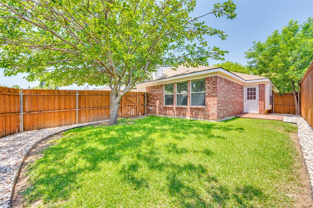 1117 Red Hawk Drive Frisco, TX 75033 - Photo 30 of 31 a front view of house with yard and green space