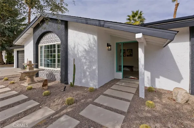a front view of a house with a porch