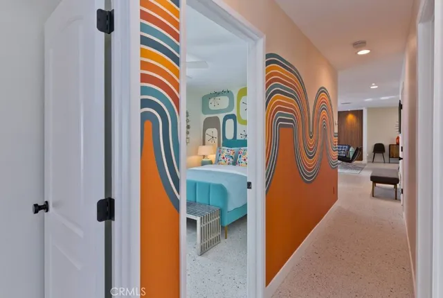 a view of an entryway with wooden floor