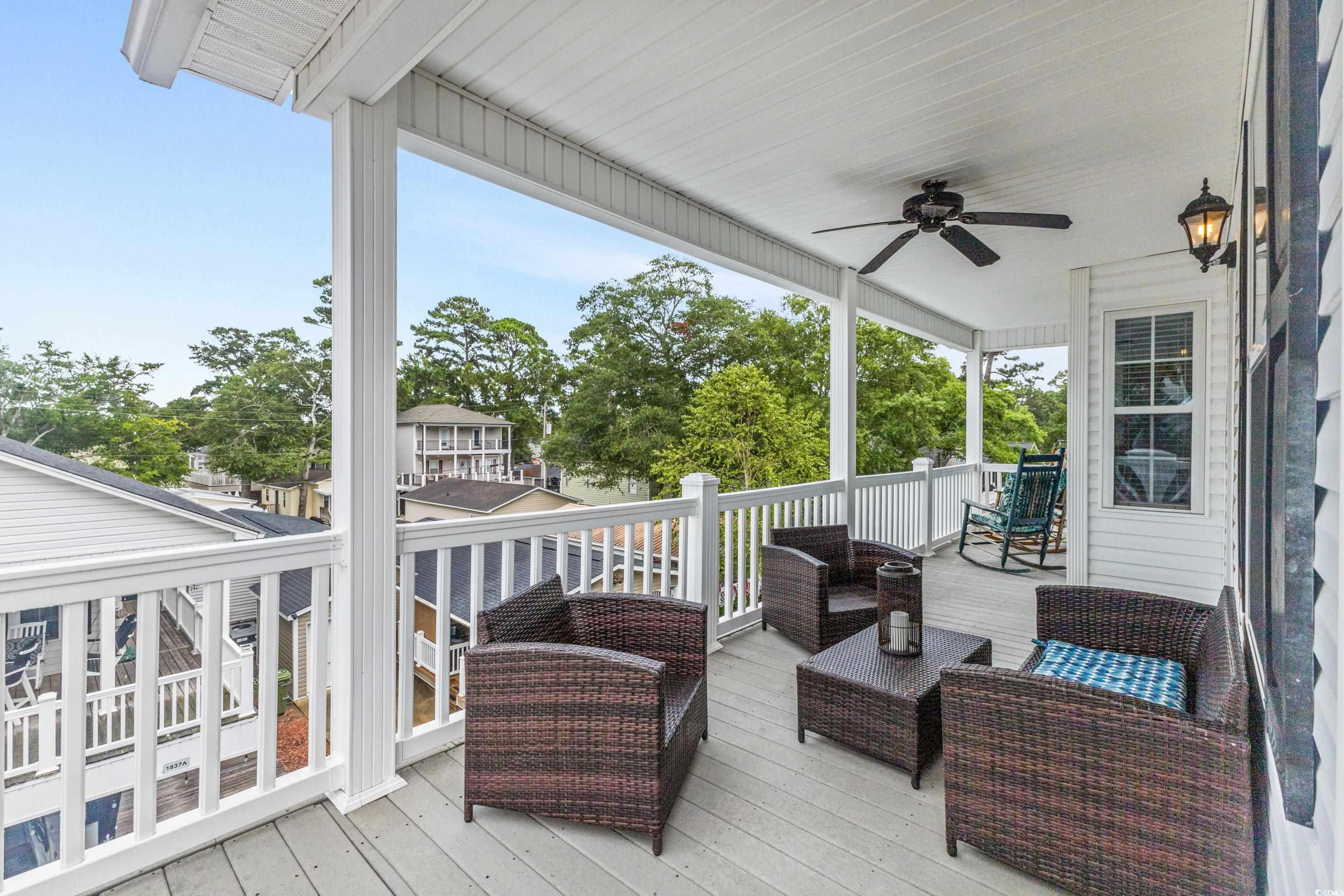 6001-1846a South Kings Highway Myrtle Beach, SC 29575 - Photo 40 of 40 Wooden deck with ceiling fan and outdoor lounge area