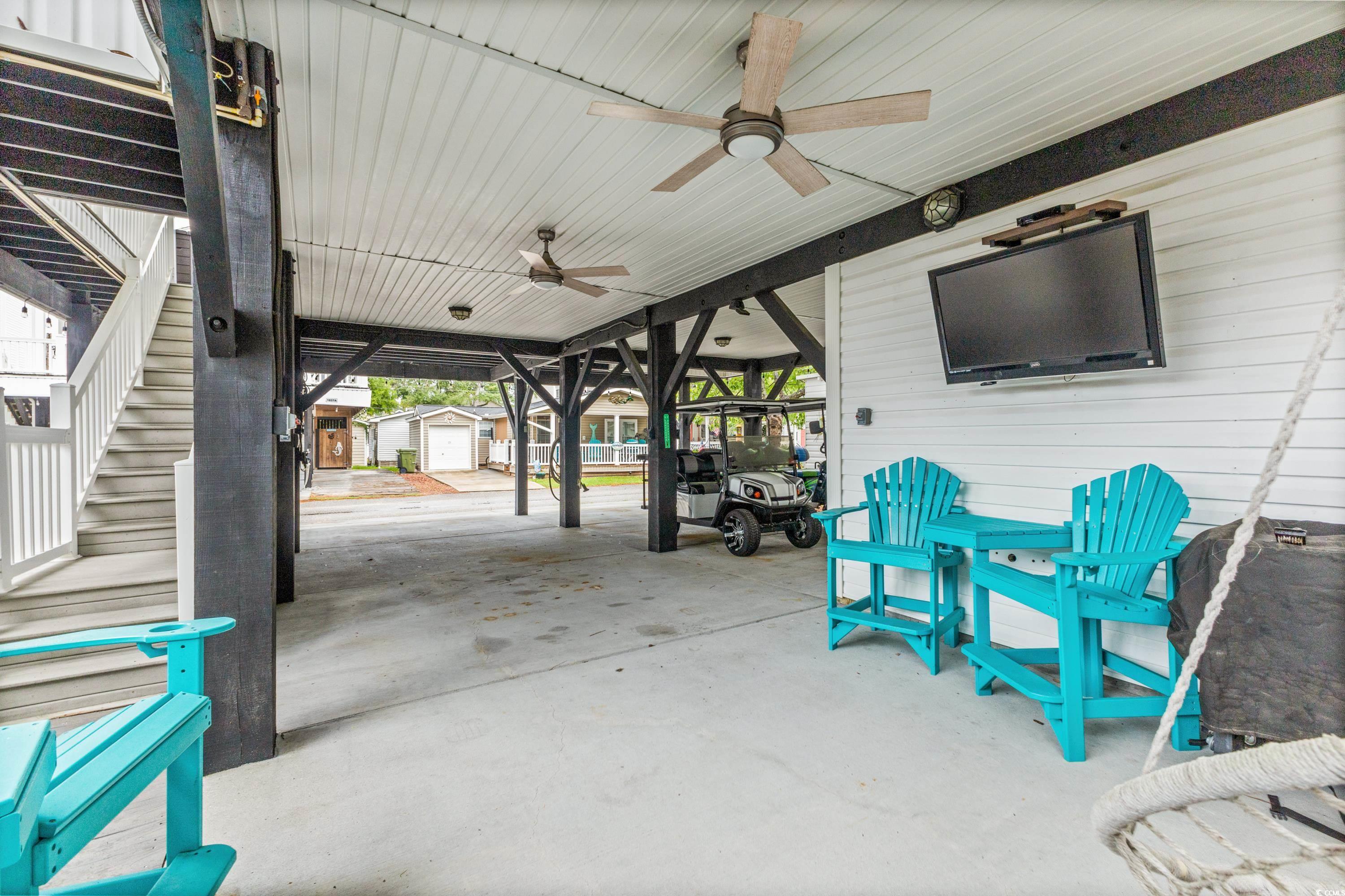 6001-1846a South Kings Highway Myrtle Beach, SC 29575 - Photo 6 of 40 View of patio / terrace with a shed and ceiling fan