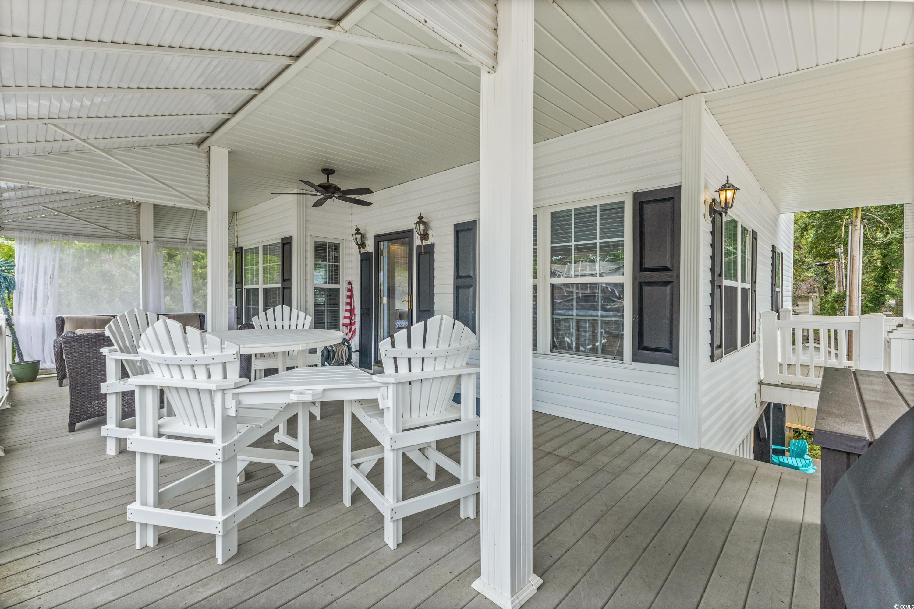 6001-1846a South Kings Highway Myrtle Beach, SC 29575 - Photo 8 of 40 Wooden terrace featuring ceiling fan