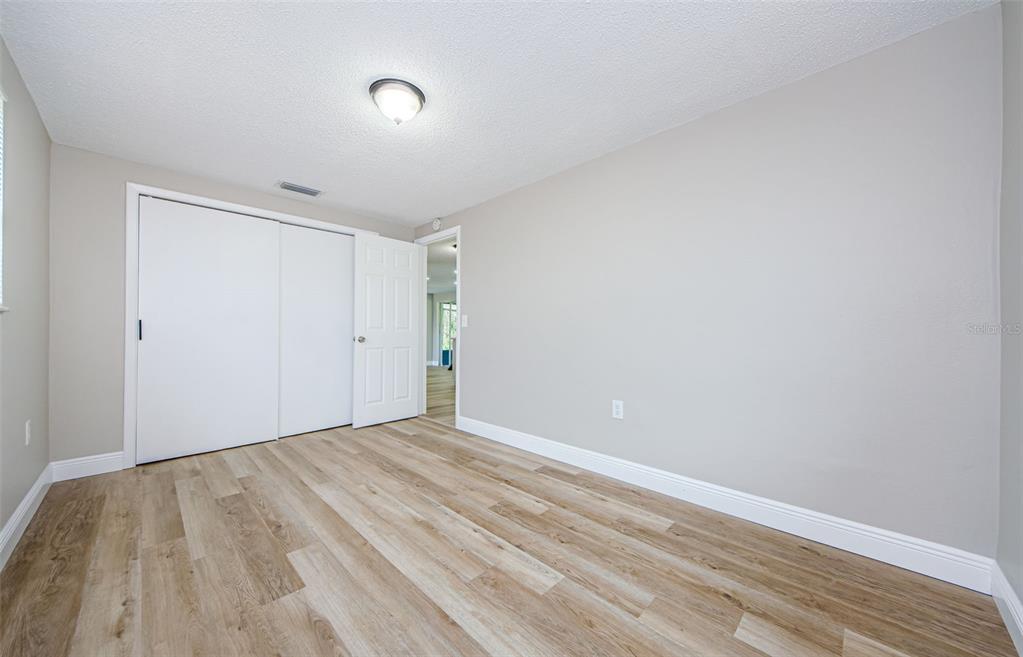 7715 Rottingham Road Port Richey, FL 34668 - Photo 20 of 32 Bedroom 1