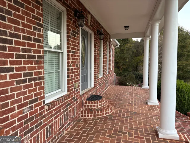 a view of a house with a porch
