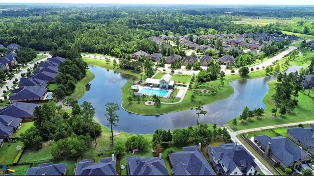 a view of a lake with a yard