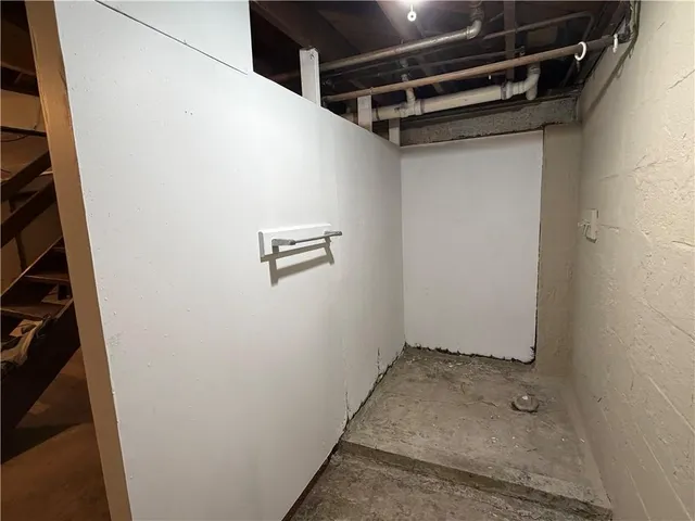 a view of a room with racks on the wall