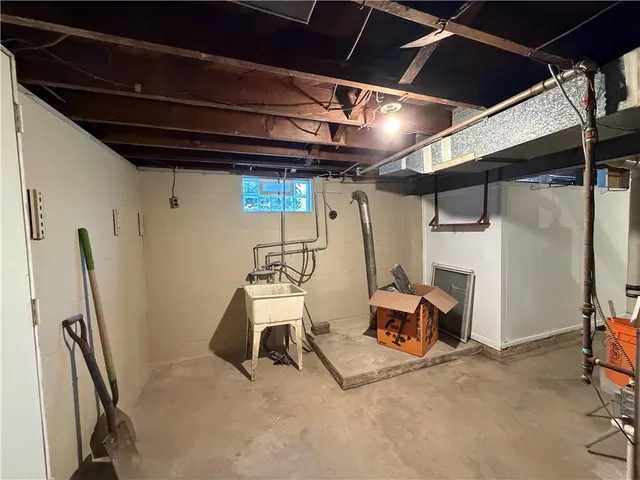 a room with gym equipment and windows