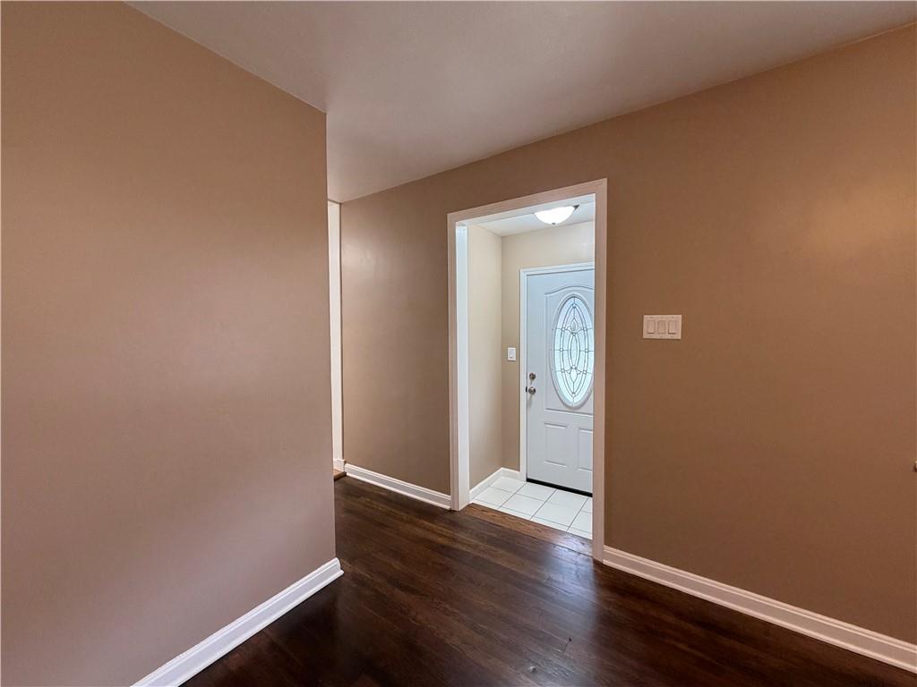 959 Bechtol Avenue Sharon, PA 16146 - Photo 6 of 29 an empty room with wooden floor and closet