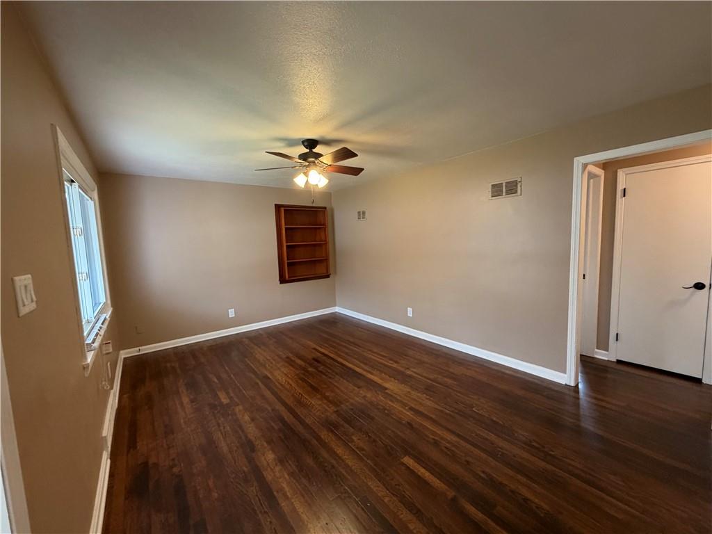 959 Bechtol Avenue Sharon, PA 16146 - Photo 7 of 29 wooden floor in an empty room with a window