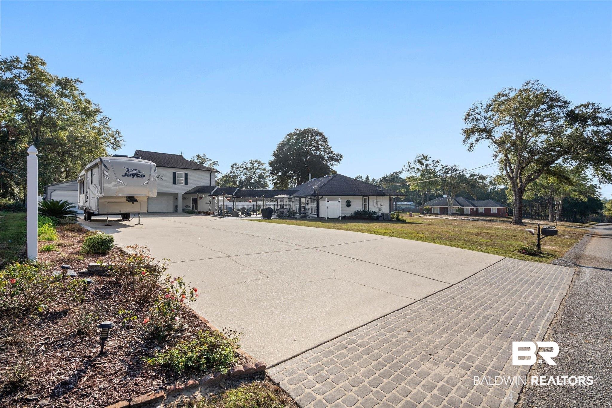 4567 Pine Avenue Saraland, AL 36571 - Photo 43 of 48 View of patio / terrace with driveway