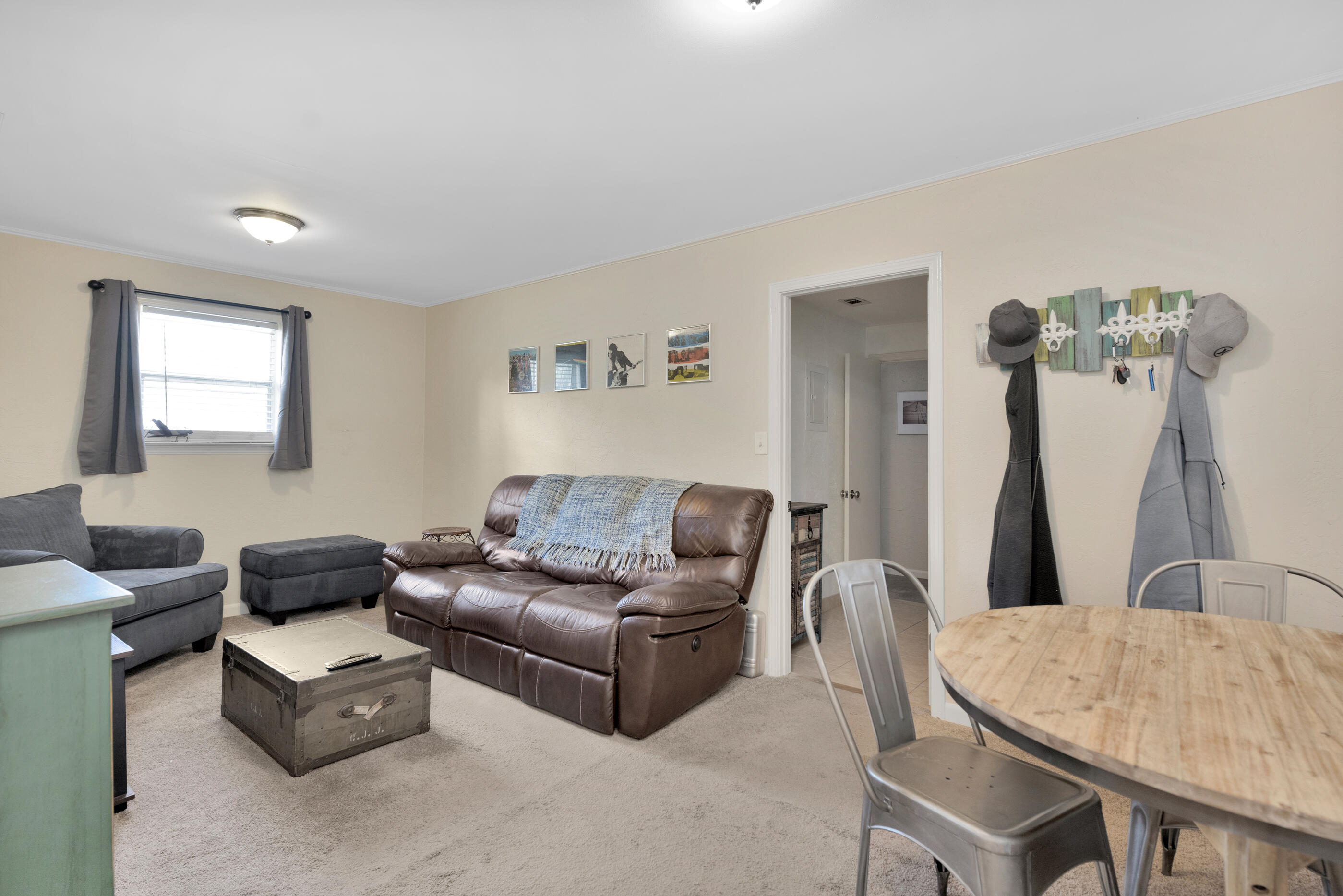 193 L Street Santa Rosa Beach, FL 32459 - Photo 4 of 24 a living room with furniture and a wooden floor