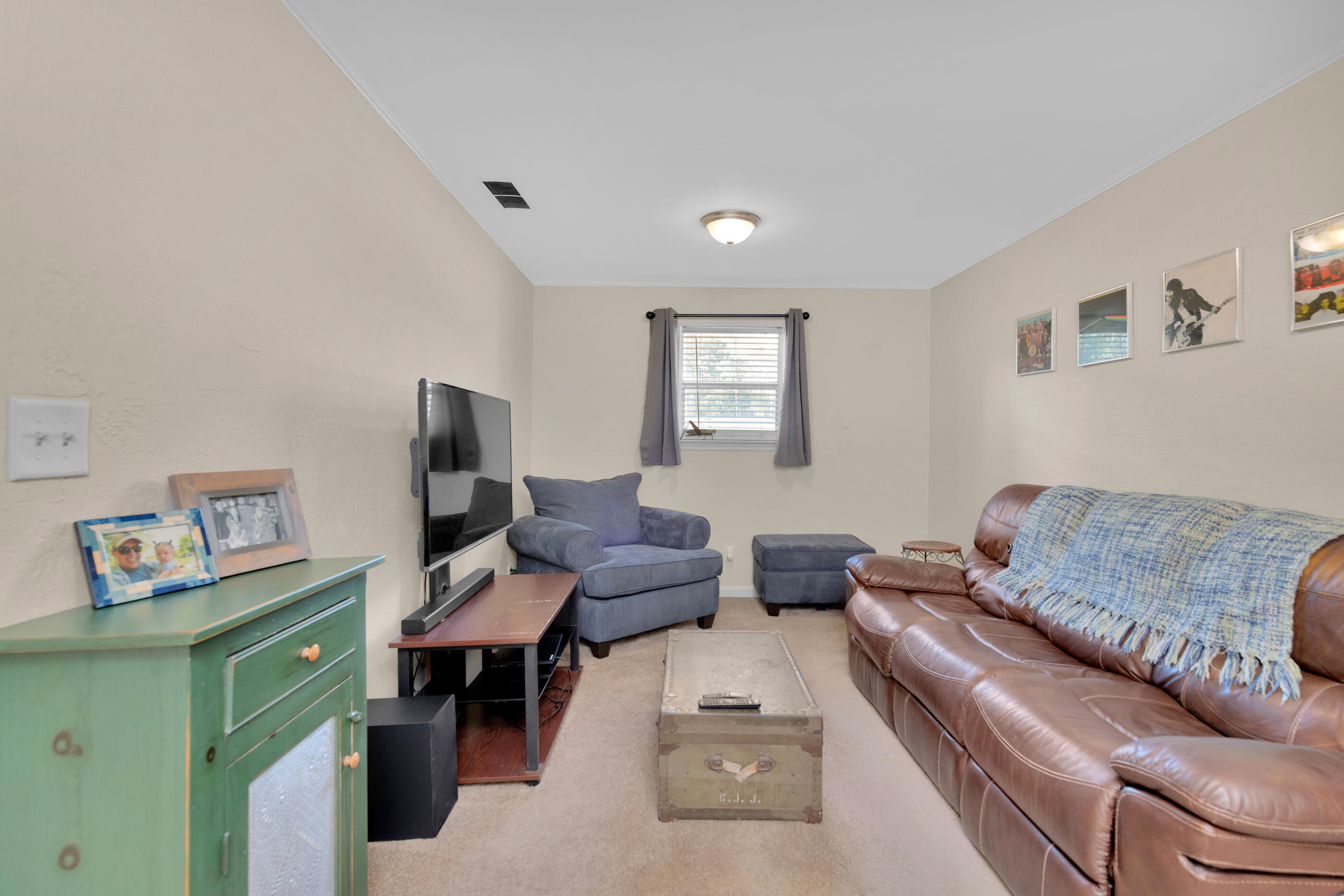 193 L Street Santa Rosa Beach, FL 32459 - Photo 5 of 24 a living room with furniture and a couch