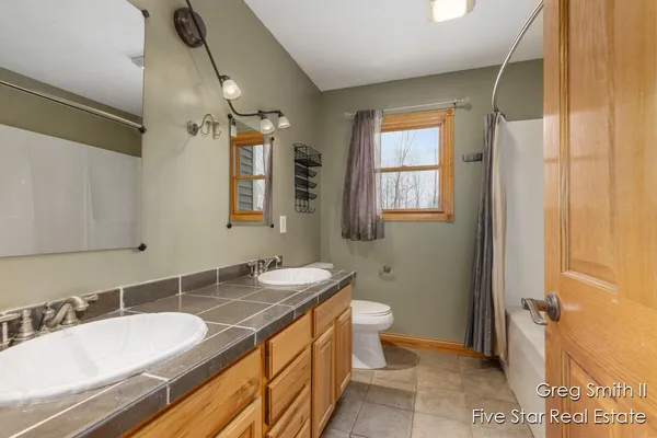 $565,000 | 4230 Fenwick Drive, Dorr, MI 49323