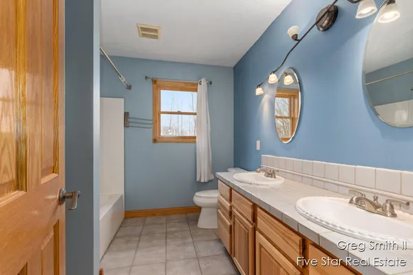 $565,000 | 4230 Fenwick Drive, Dorr, MI 49323