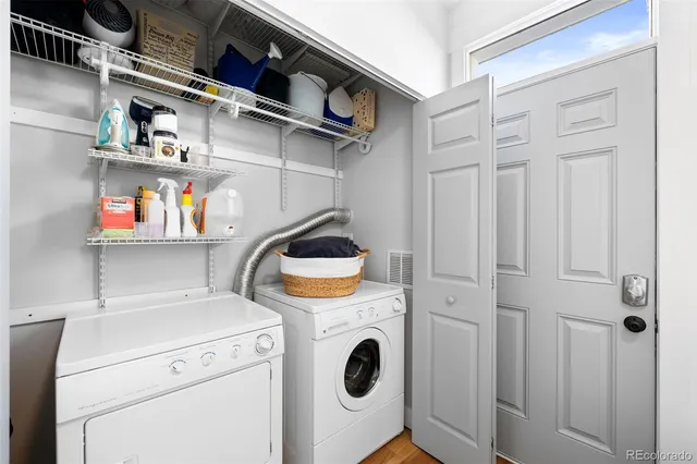 a utility room with dryer and washer