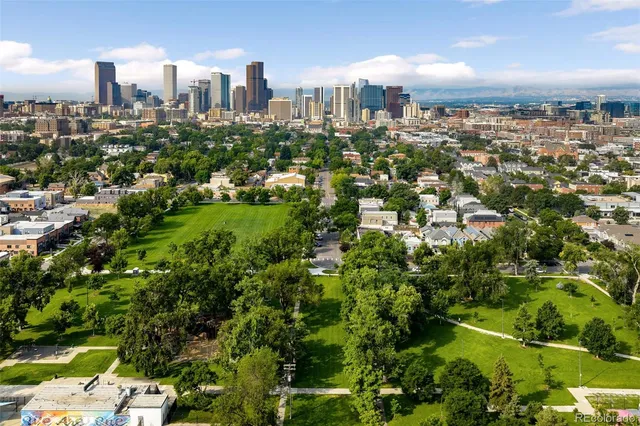 a view of a city with tall buildings