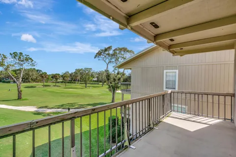 a view of a porch with a yard