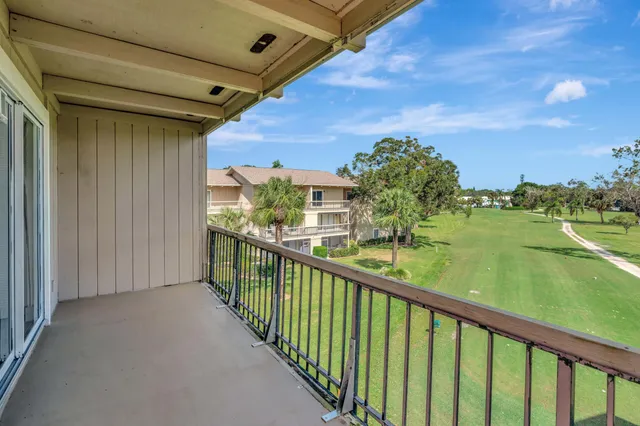 a view of a balcony with lake